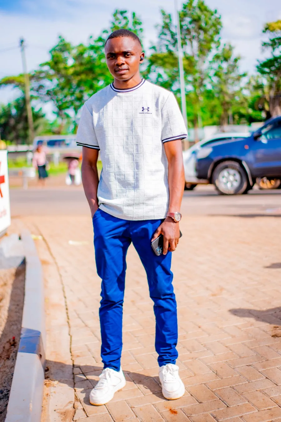 Kelvin Wanyoike standing outdoors